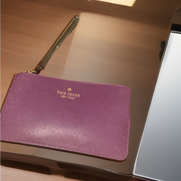 kate spade Handbags - NEW Kate Spade Burgundy Wristlet, Hard to Find Color, NWT Great Gift